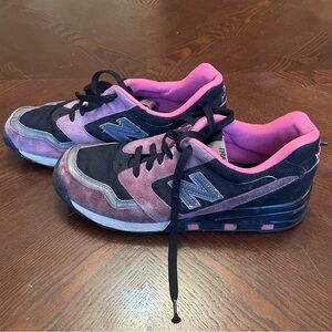 New Balance pink and black shoes 8.5